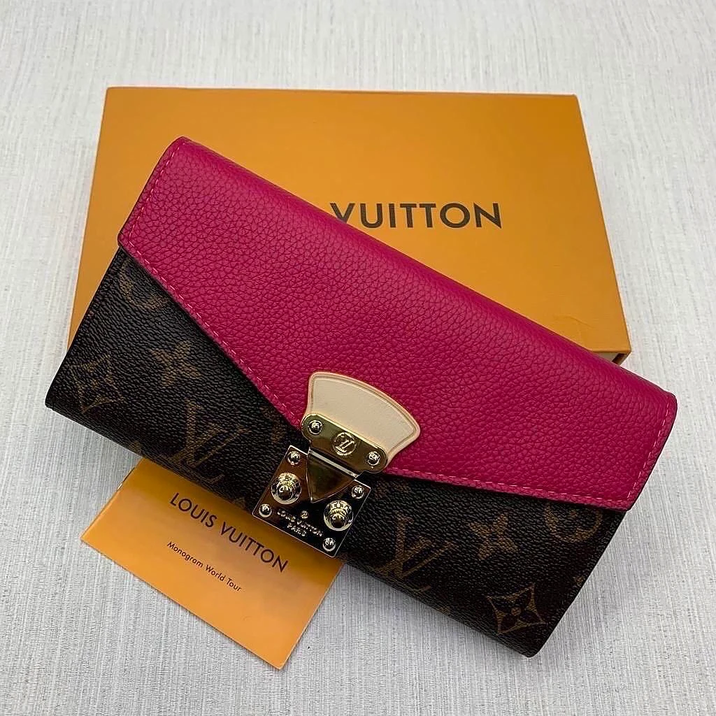 Portefeuille Louis Vuitton Pallas en toile monogramme et cuir rose fuchsia