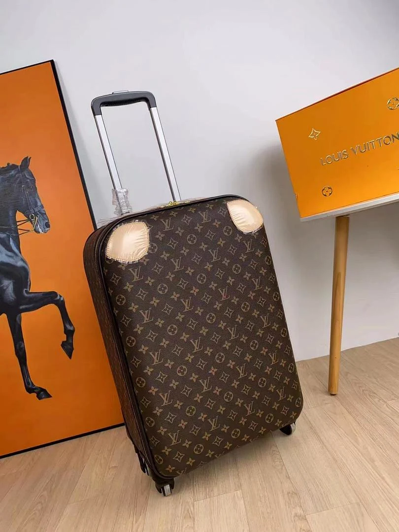 Valise trolley Louis Vuitton en toile monogramme avec coffret orange