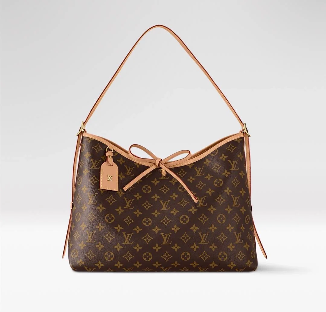 Sac Louis Vuitton CarryAll MM en toile Monogram avec nœud en cuir