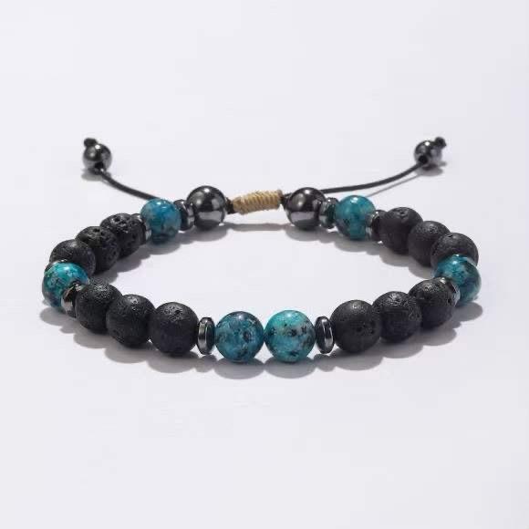 Bracelet pierre de lave noire avec perles turquoise et anneaux hématite