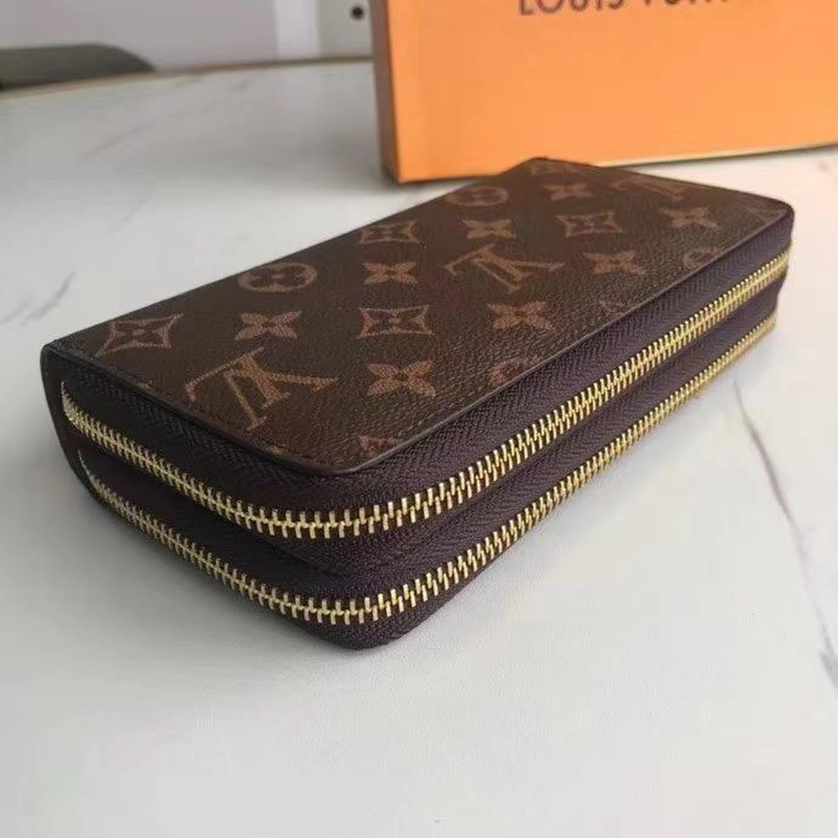 Portefeuille Zippy Louis Vuitton en toile Monogram marron, fermeture dorée