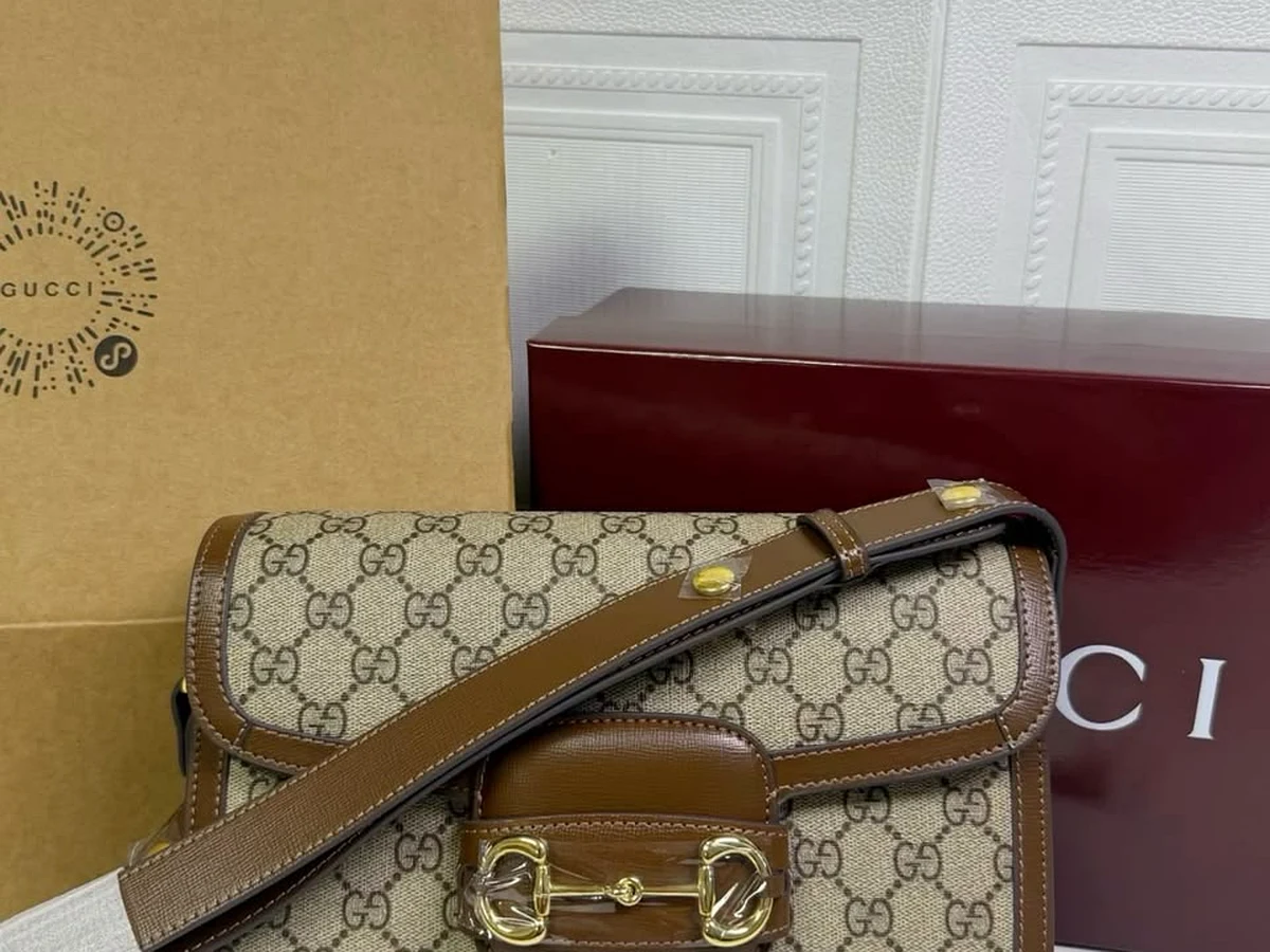 Sac Gucci Horsebit 1955 en toile GG Supreme et cuir marron