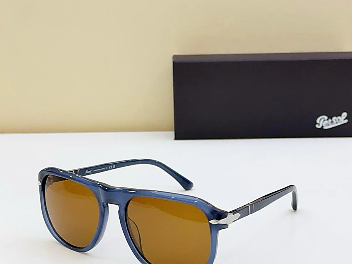 Lunettes de soleil PERSOL monture bleue à verres marron avec écrin